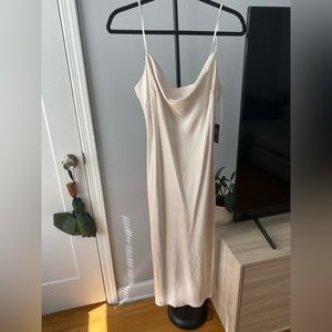 Ivory Draped neck midi dress with double spaghetti straps. Brand new. Size:Large